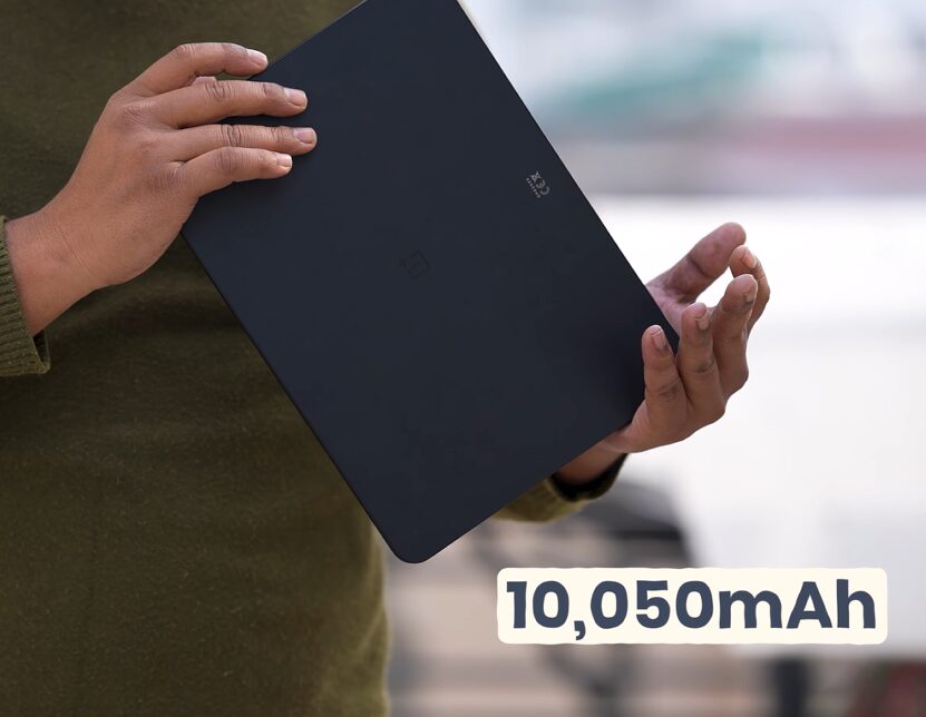 Person holding tablet with battery capacity
